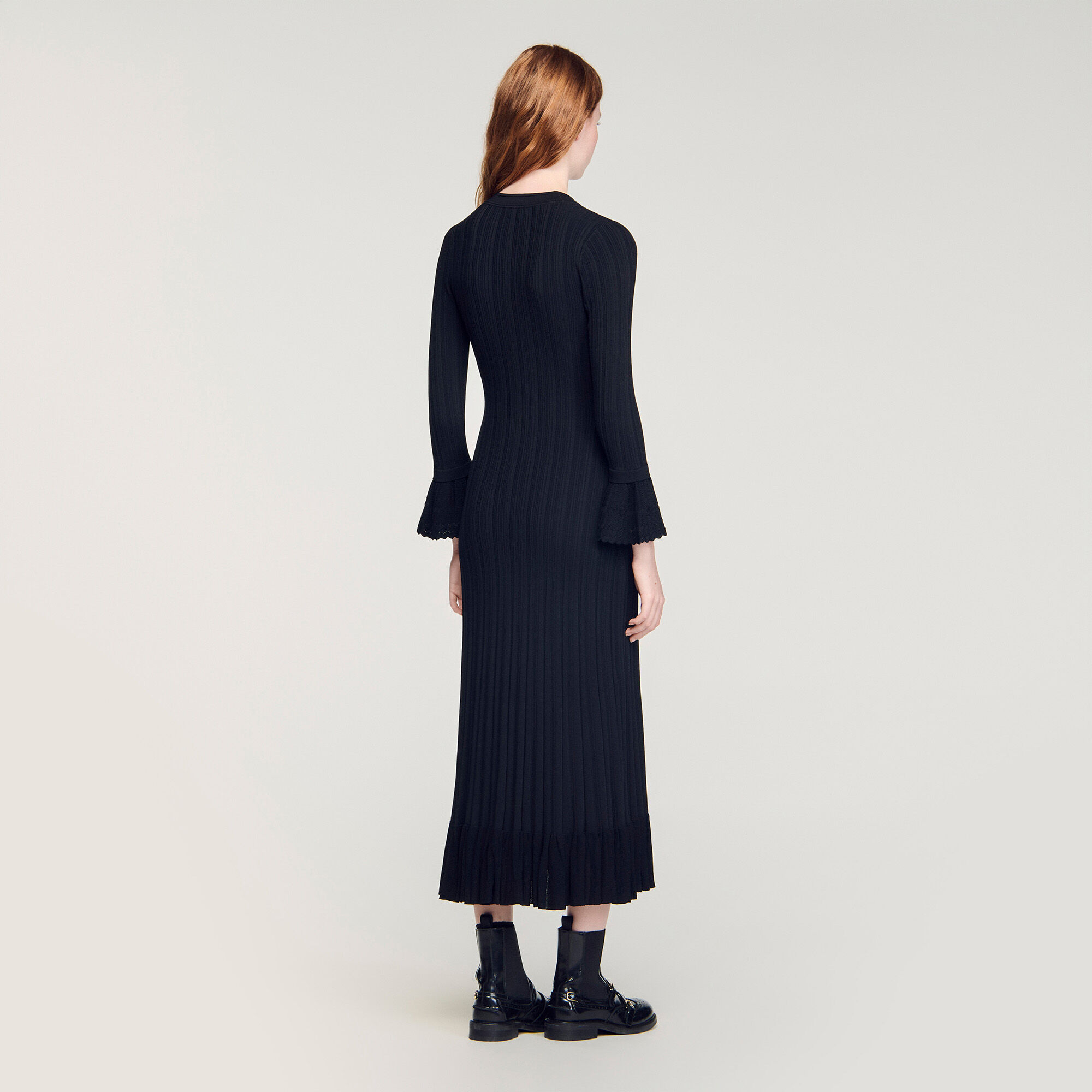 Lange gebreide jurk met volant