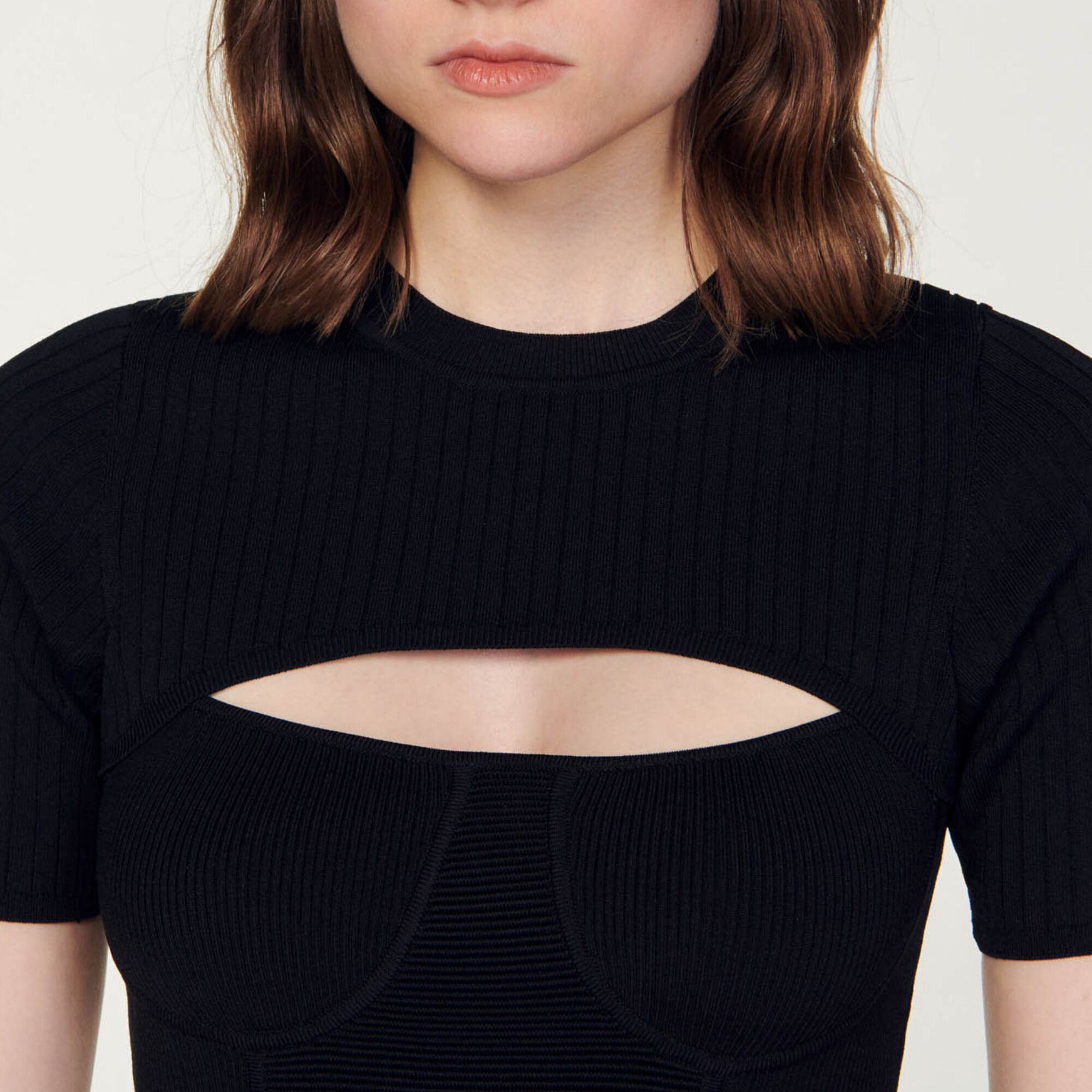 Opengewerkte korte trui