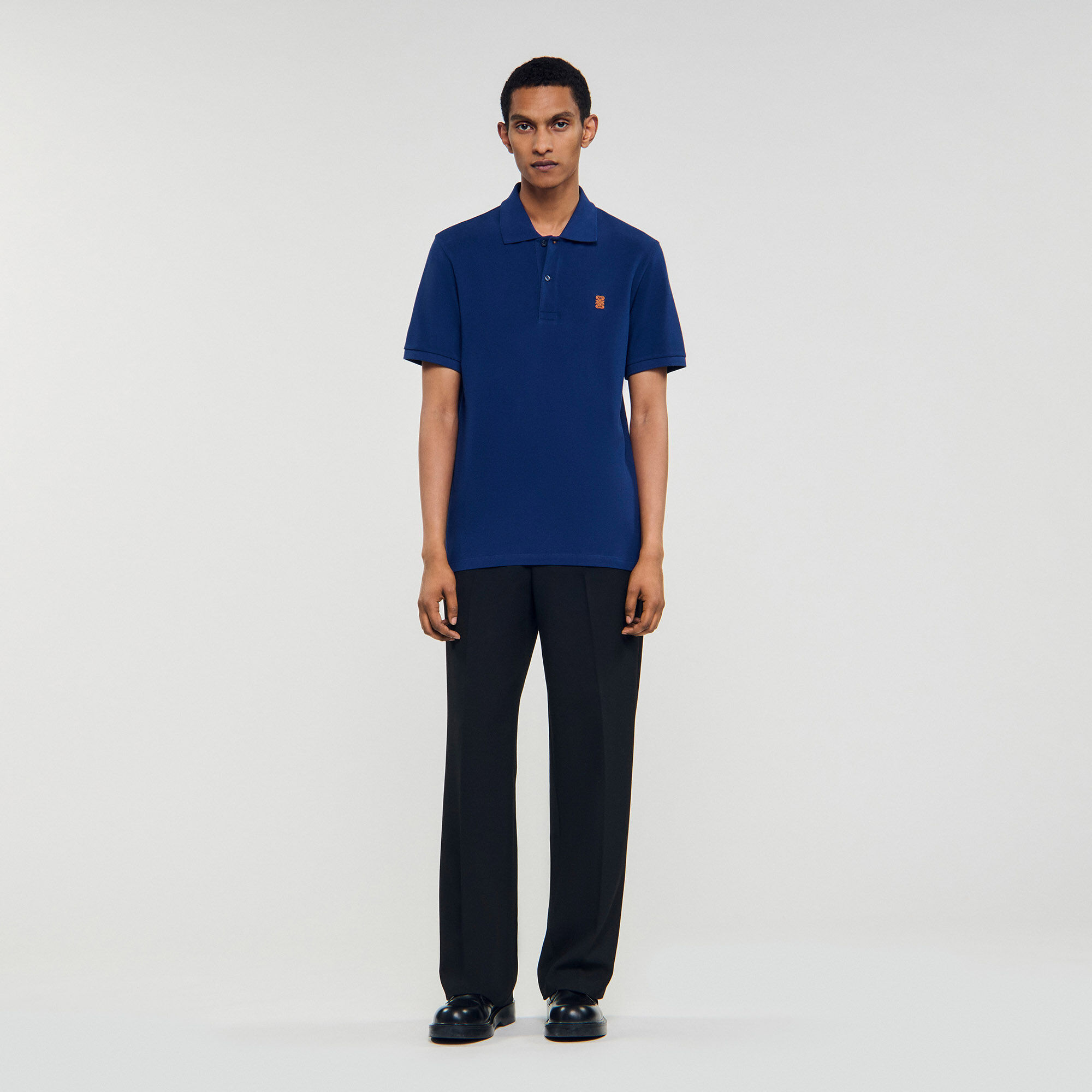 Poloshirt met leren logo