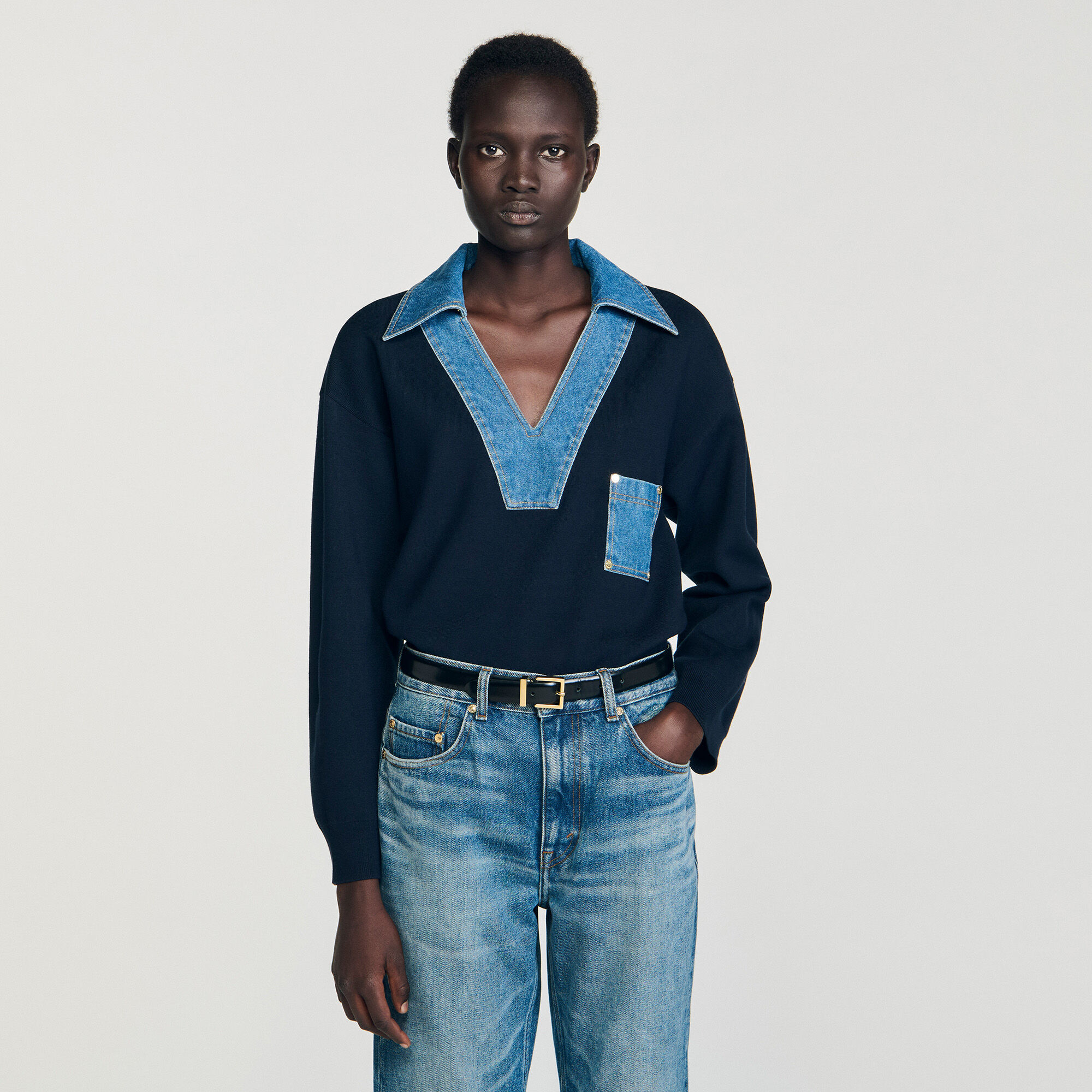 Trui met denimdetails