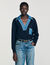 Trui met denimdetails