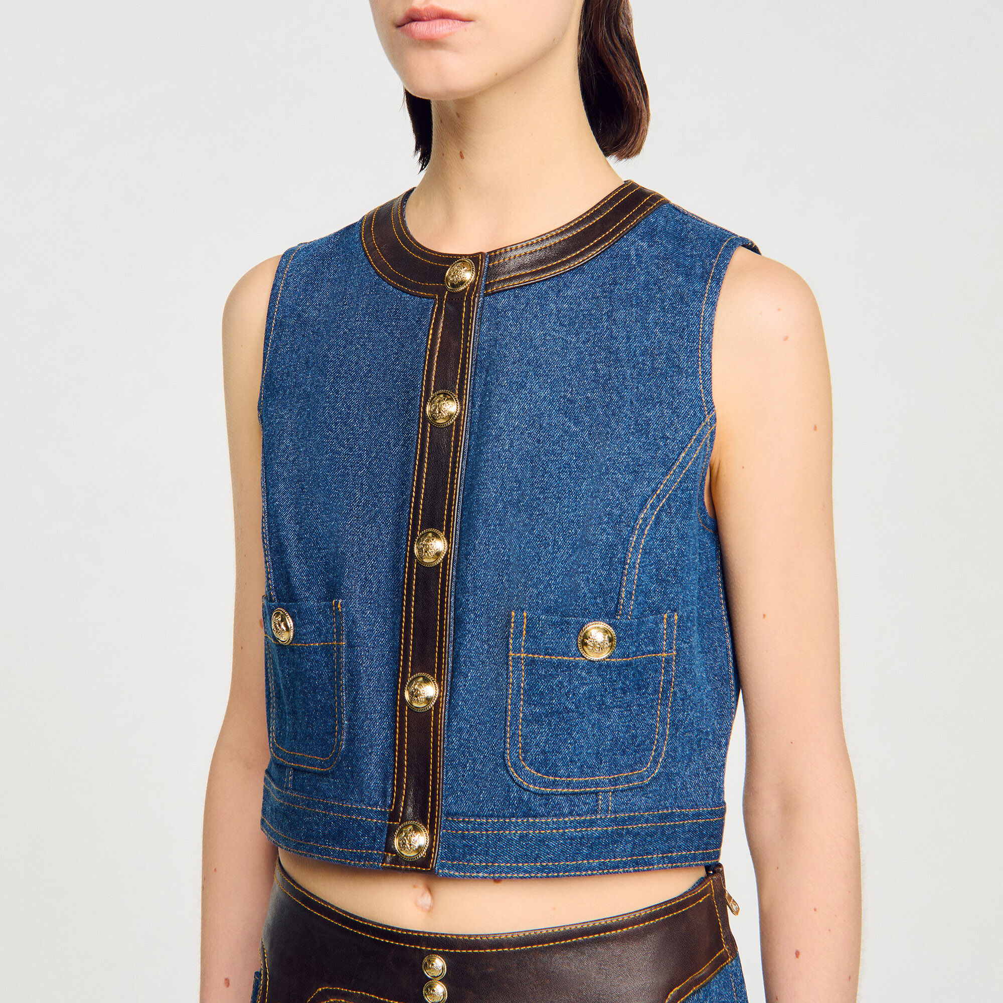 Top van denim en leer