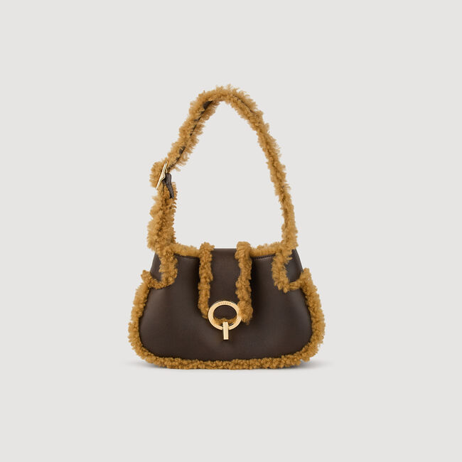 Tas Janet leer en wol