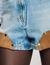 Short denim en su&egrave;de met rivets