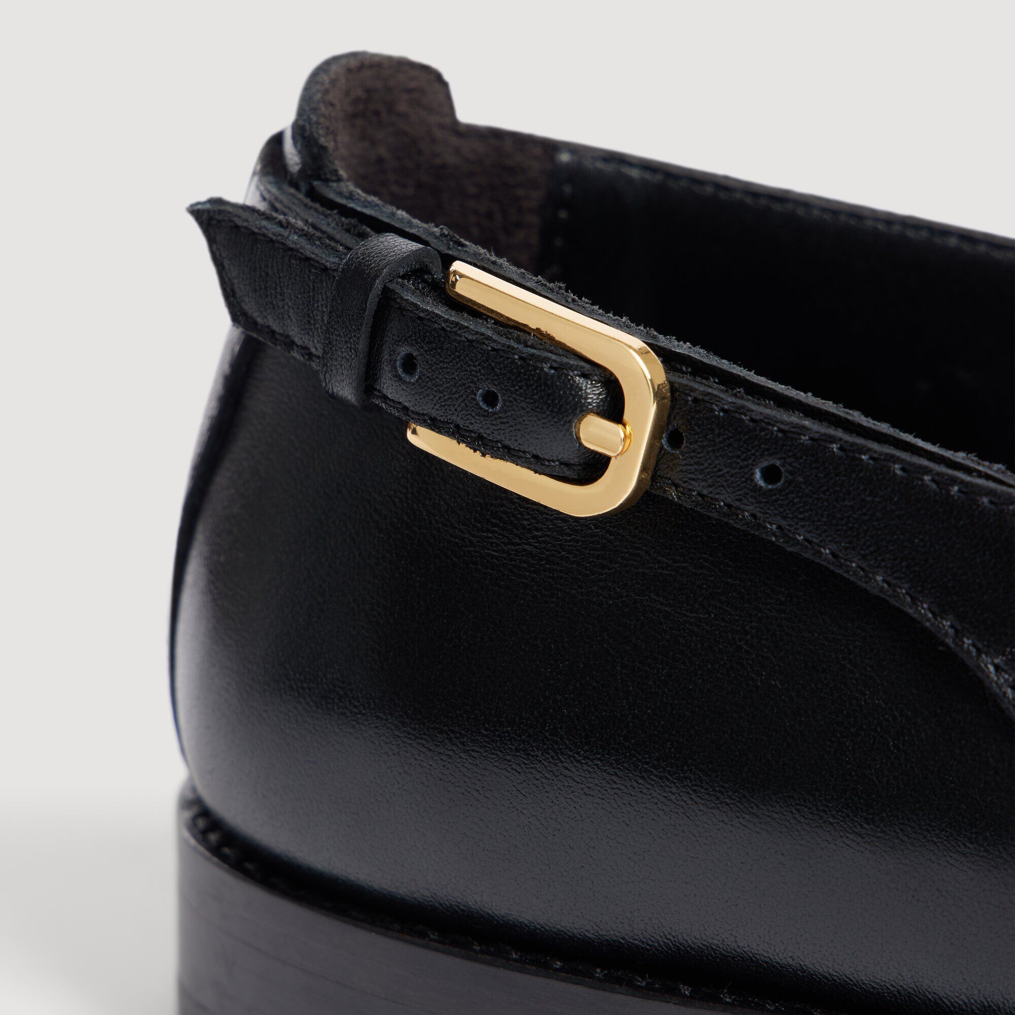 Leren mocassins met gesp