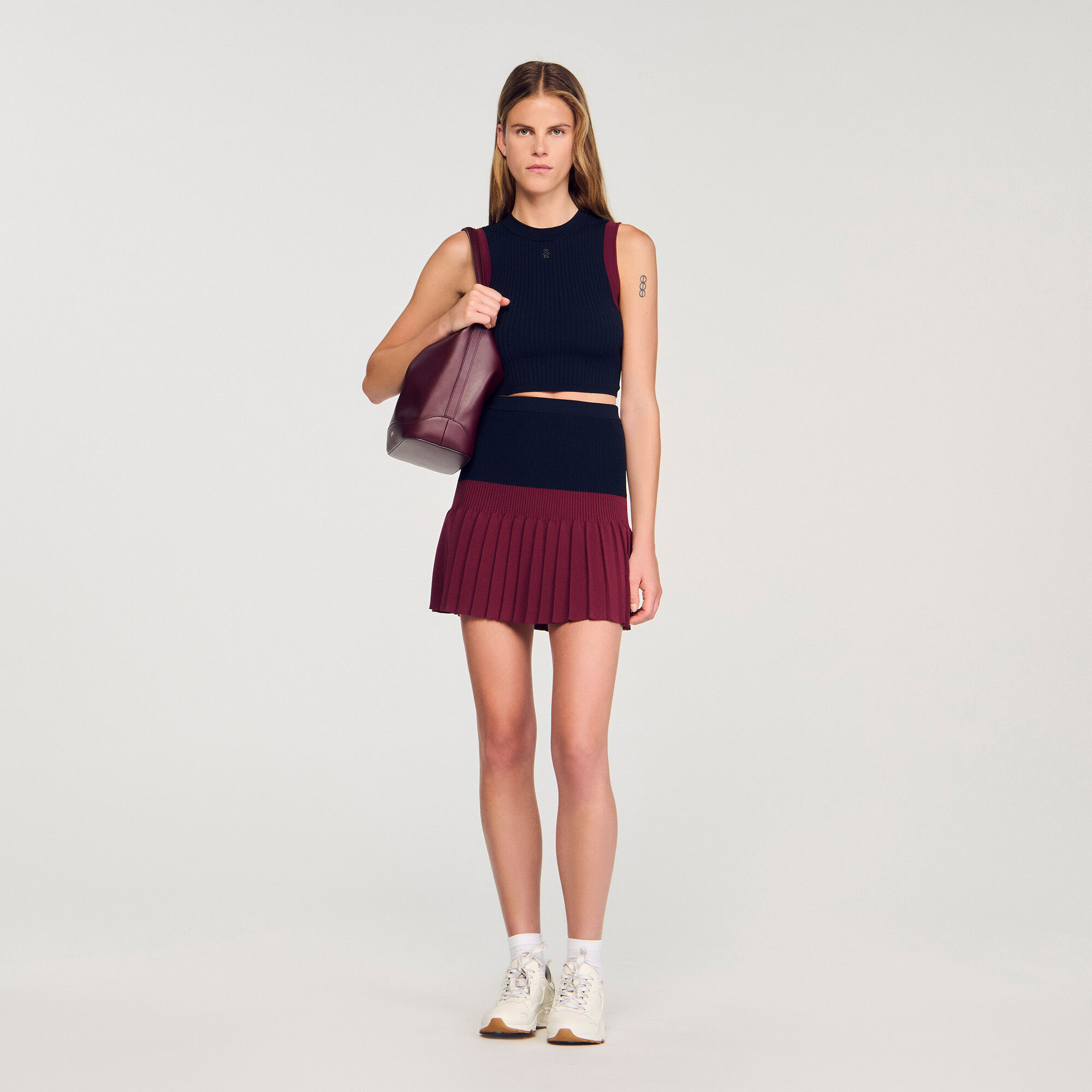 Korte geplooide bicolor rok