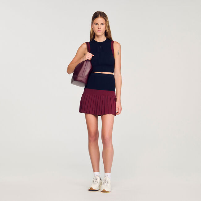 Korte geplooide bicolor rok