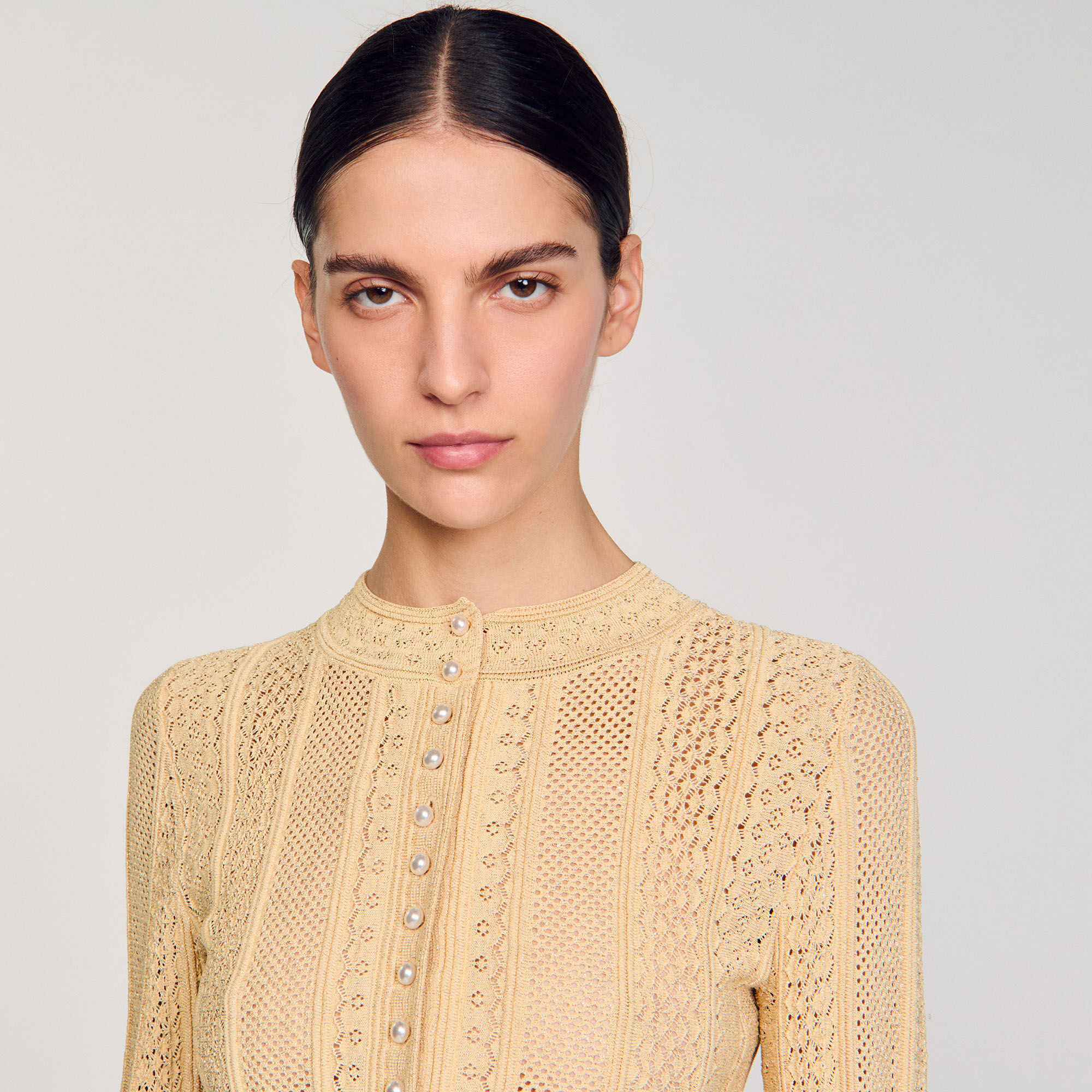 Cardigan pointillé gebreid