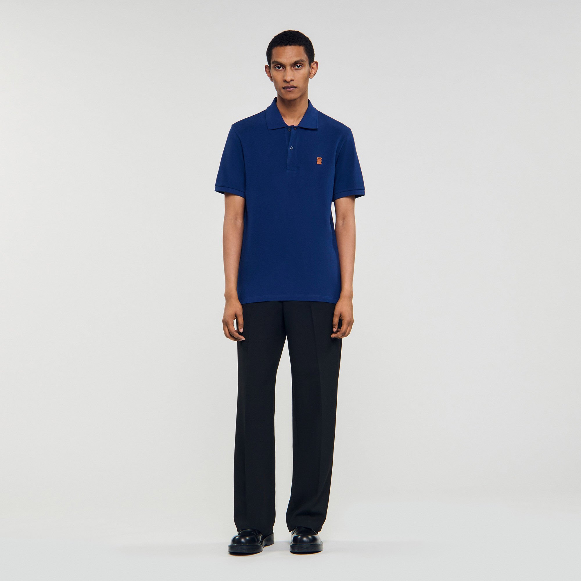 Poloshirt met leren logo